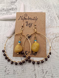 Amber and brown wire wrapped hoop earrings with natural stone beads, handmade by Melly