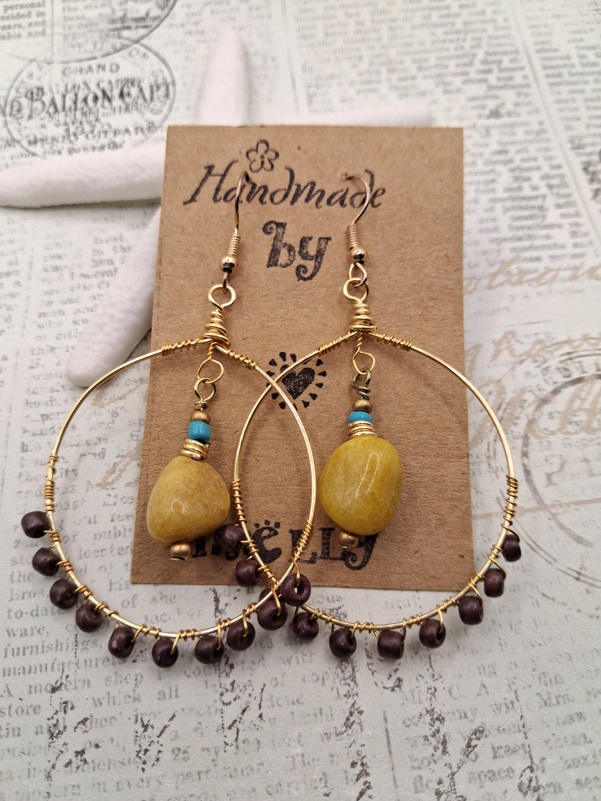 Amber and brown wire wrapped hoop earrings with natural stone beads, handmade by Melly