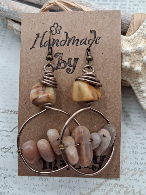 Amber and earthy beaded rocky dangle earrings featuring polished stones and wire loops, handmade by Melly