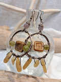 Amber and lavender dream catcher hoop earring with wire-wrapped beads, handmade by Melly