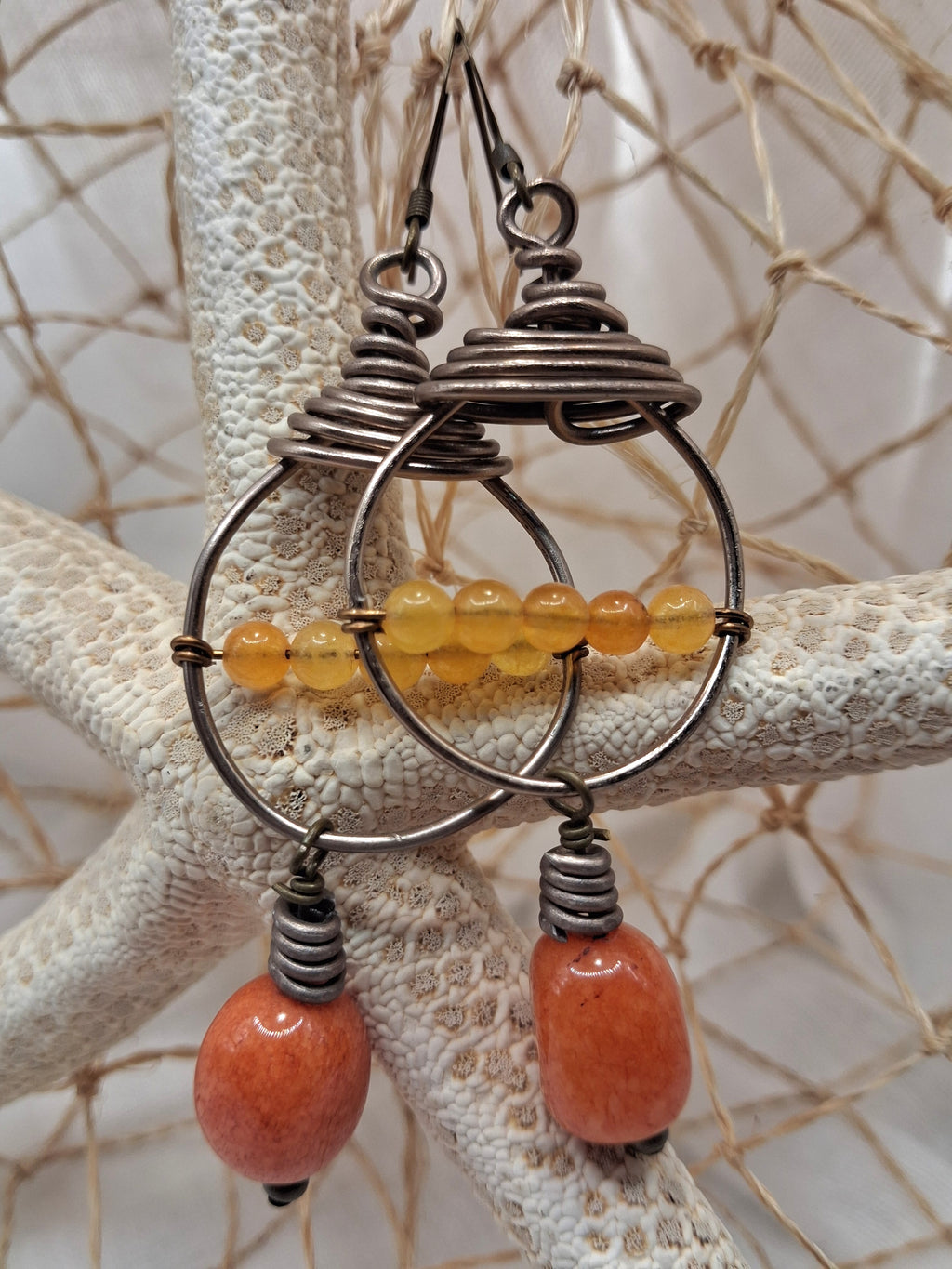 Amber and orange wire wrapped Kasper dangle earrings with beaded hoops, handmade by Melly