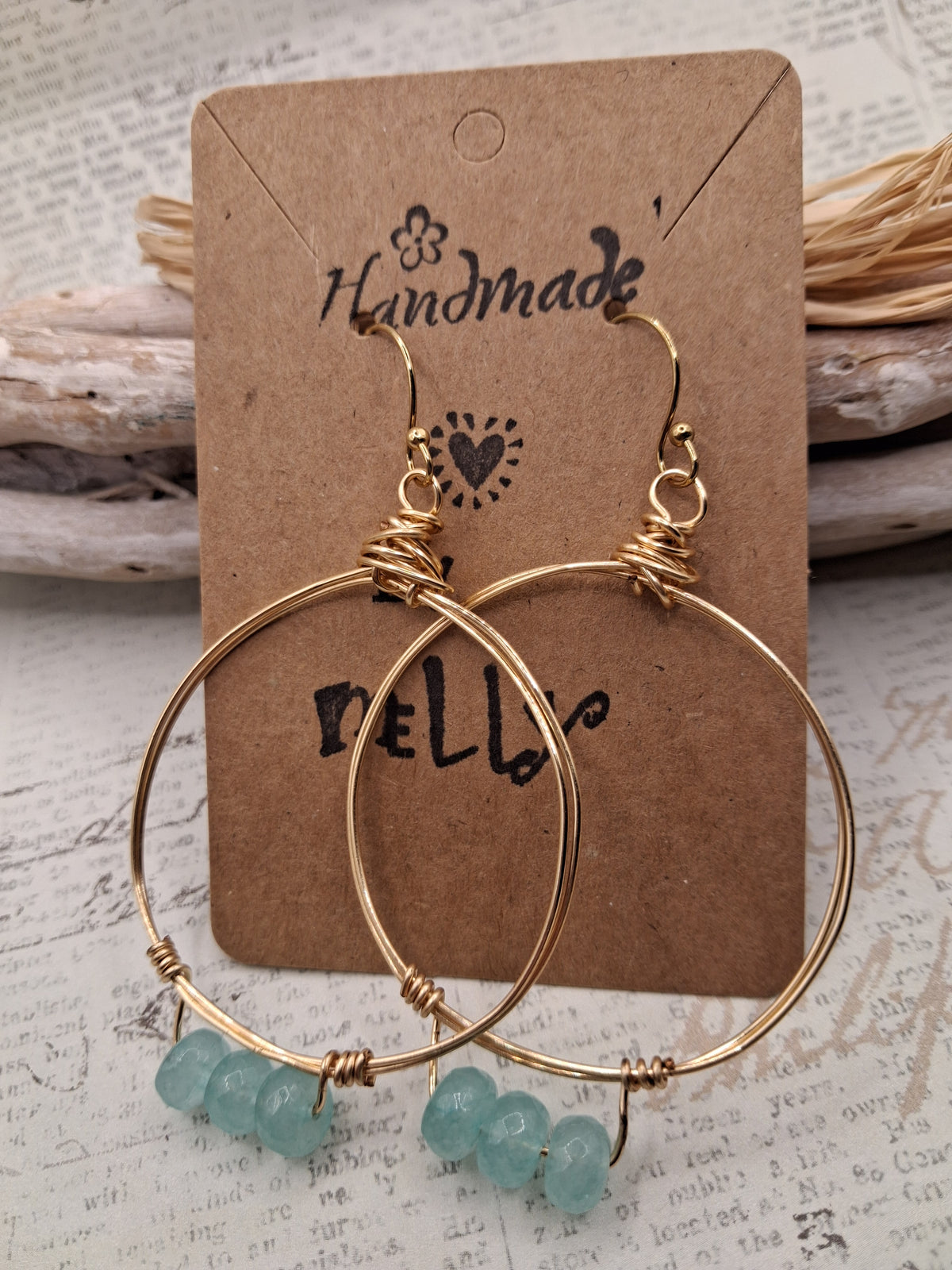 Aqua blue and gold wire wrapped small hoop earrings with gemstone beads, handmade by Melly