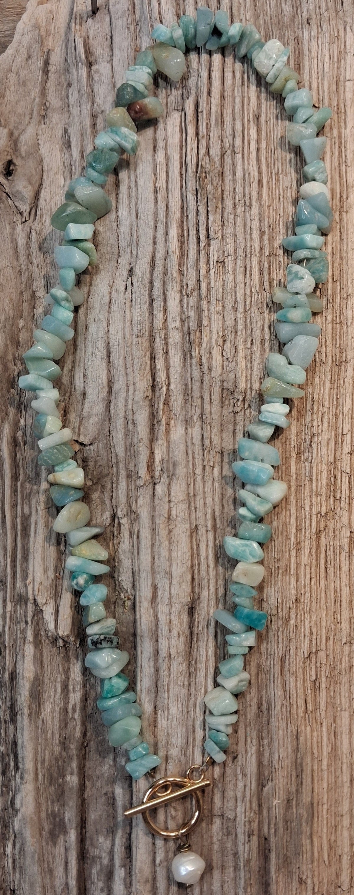 Light blue aquamarine beaded gemstone necklace with a single white pearl, handmade by Melly
