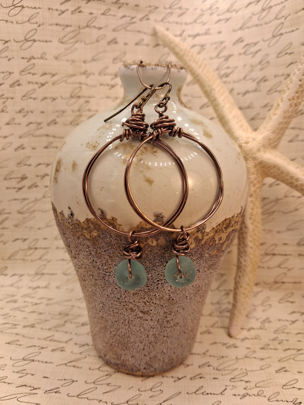 Aquamarine glass bead and wire wrapped copper hoop earrings, handmade by Melly