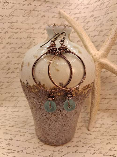 Aquamarine glass bead and wire wrapped copper hoop earrings, handmade by Melly