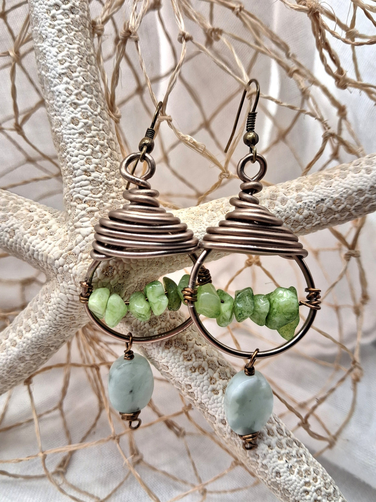 Green aventurine beaded dangle earrings with wire-wrapped copper coils and gemstone drops, handmade by Melly