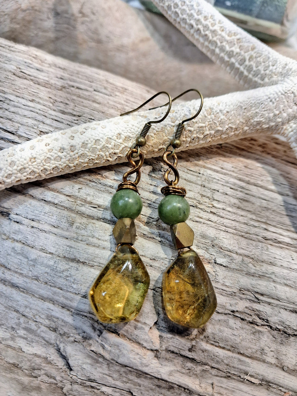 Emerald green and amber teardrop dangle earrings with bronze wirework and beads, handmade by Melly