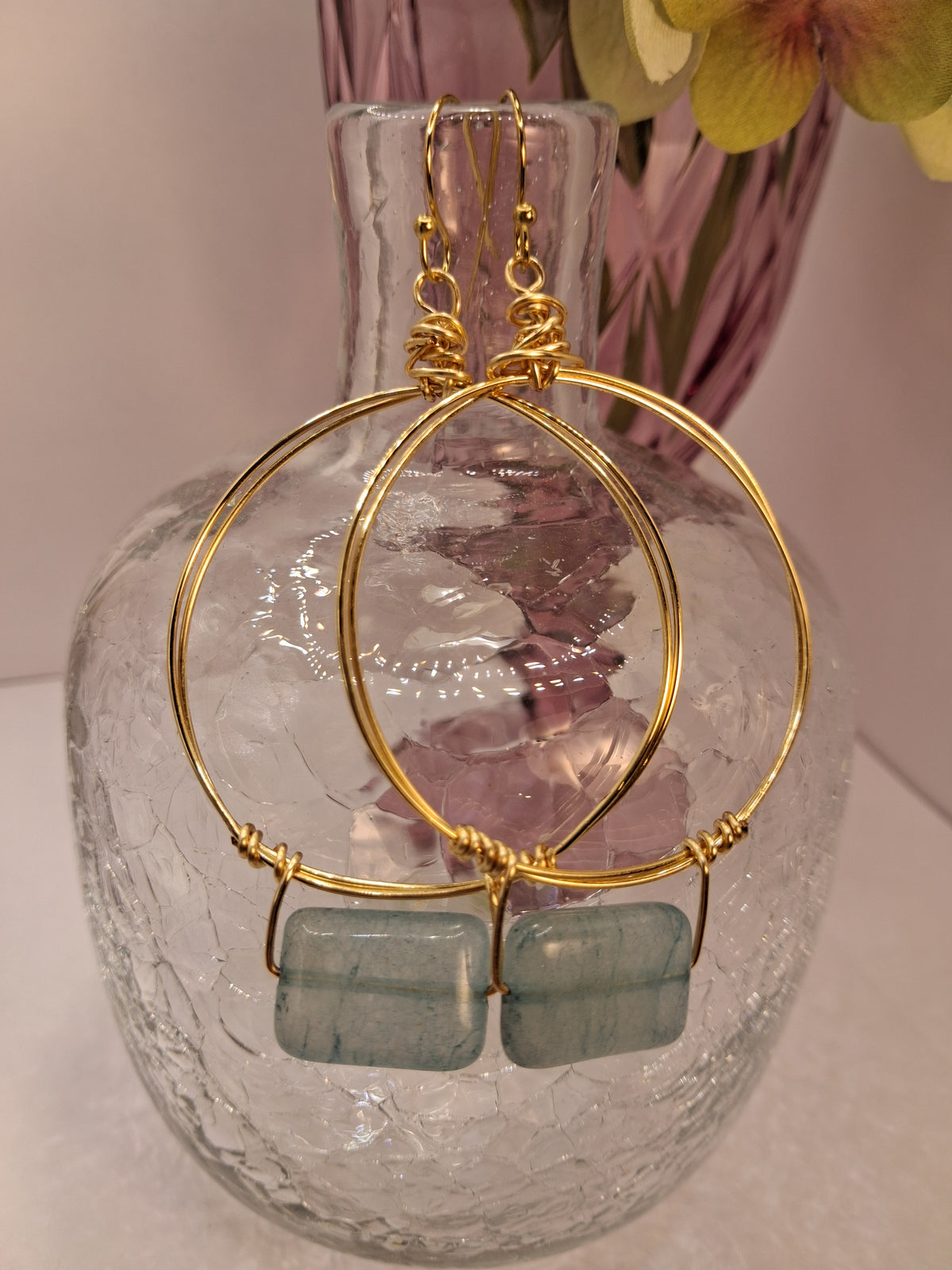 Ice blue and gold wire wrapped large hoop earrings with rectangular beads, handmade by Melly