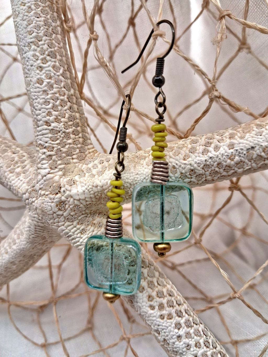 Icey blue and lime beaded dangle earrings featuring square glass beads and metal hardware handmade by Melly