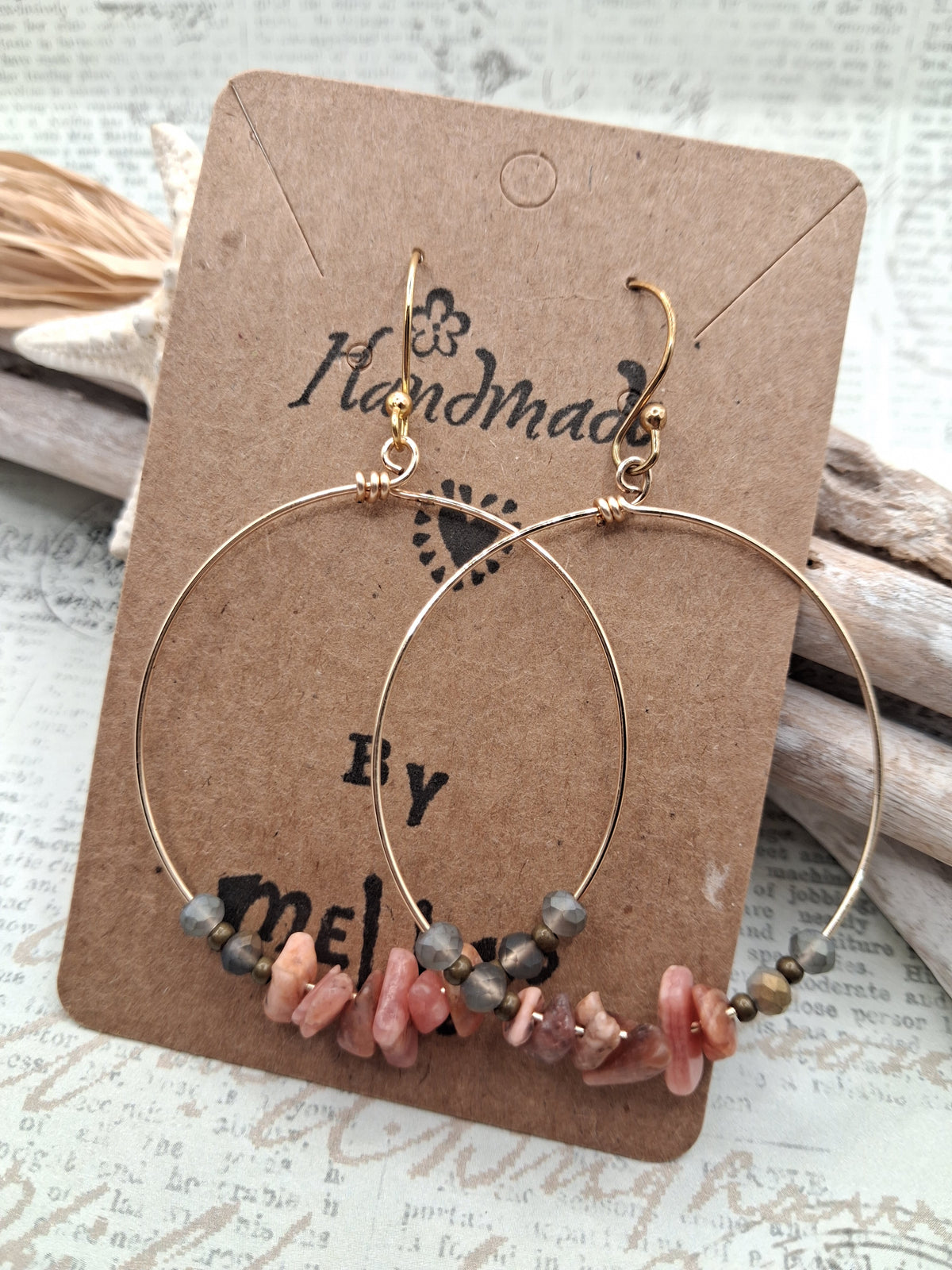 Light grey and pink quartz beaded hoop earrings with metallic accents, handmade by Melly