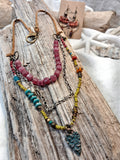 Olive and burgundy beaded fairy tale necklace with multi-strand chains and pendant, handmade by Melly