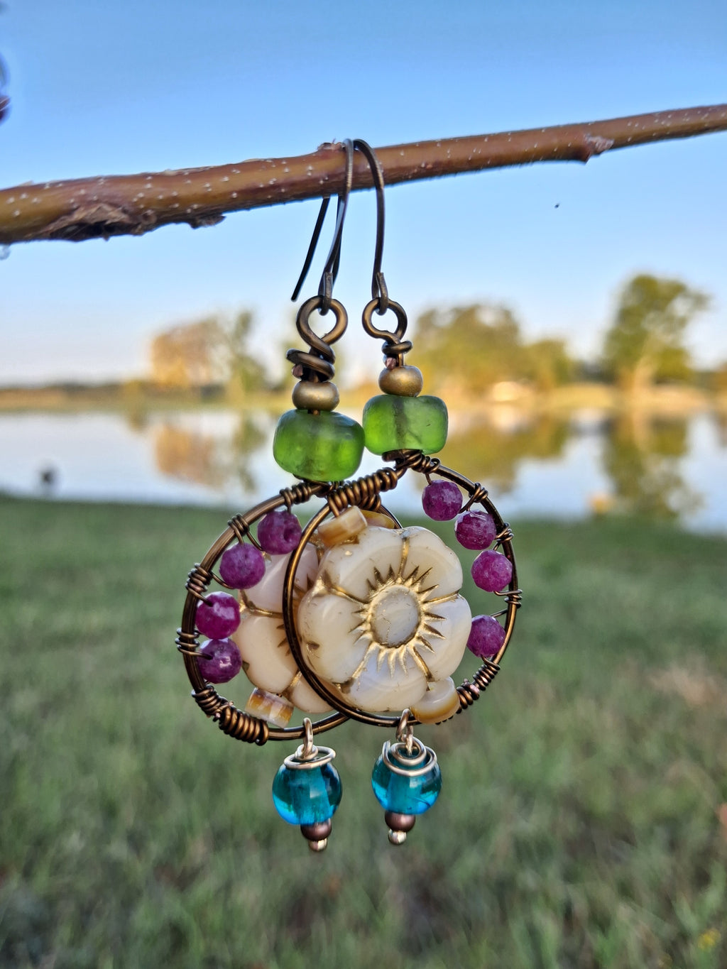 Red ruby and copper wire-wrapped dangle earrings handmade by Melly