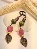 Pink strawberry quartz and emerald green dangle earrings with brass leaf charms, handmade by Melly