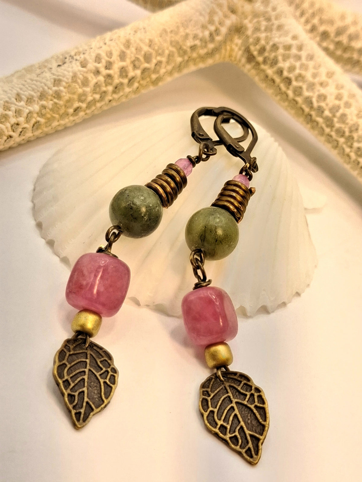 Pink strawberry quartz and emerald green dangle earrings with brass leaf charms, handmade by Melly