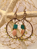Teal and peach beaded wire wrapped Sylvester hoop earrings with brass wire, handmade by Melly