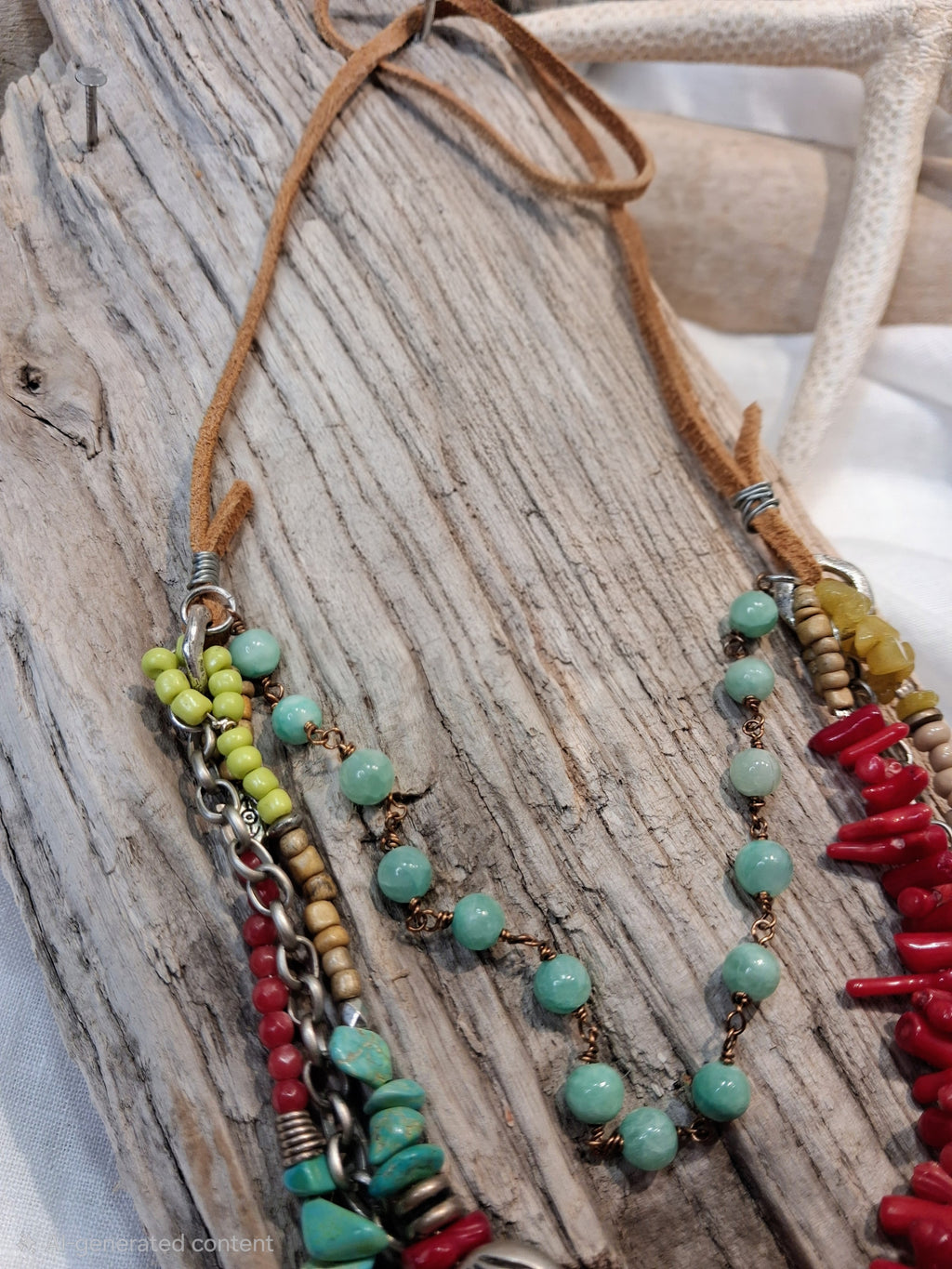 Multi-color beaded statement necklace featuring turquoise stones and coral branches, handmade by Melly.