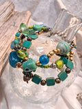 Teal, turquoise, and cobalt beaded ocean breeze bracelet with glass beads, handmade by Melly