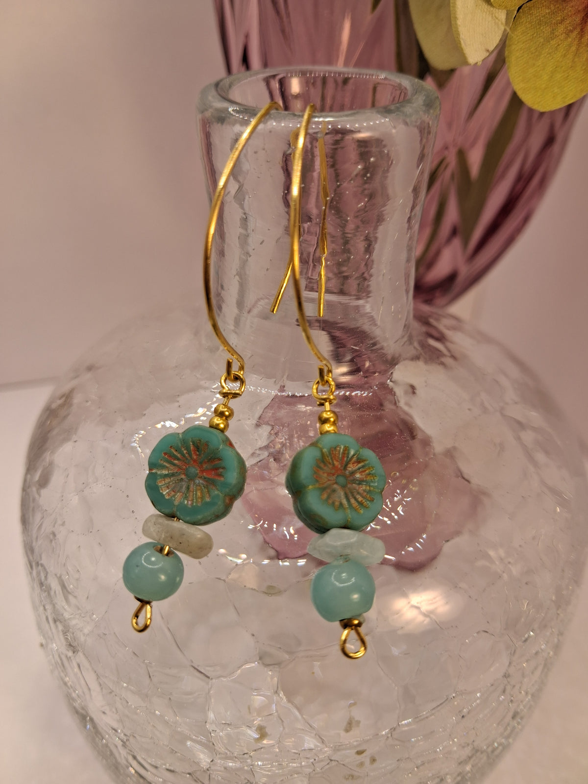 Turquoise and aquamarine flower hoop earrings with glass beads and gold wires, handmade by Melly