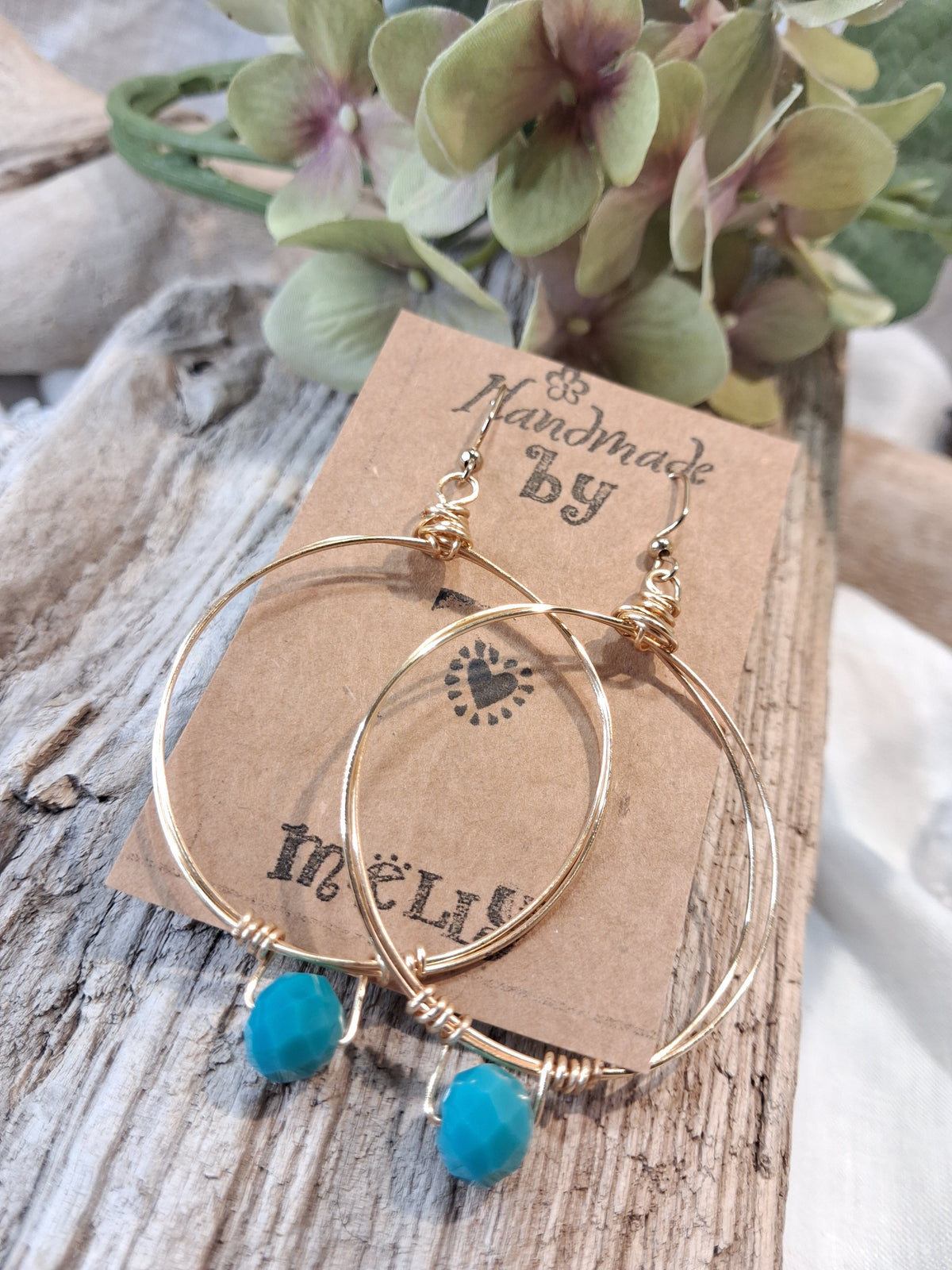 Turquoise and gold wire wrapped Millie hoop earrings with faceted turquoise beads, handmade by Melly