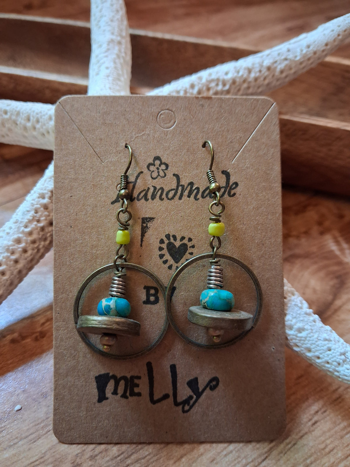 Turquoise and lime ufo hoop earrings with metal wire wrapping and beads, handmade by Melly