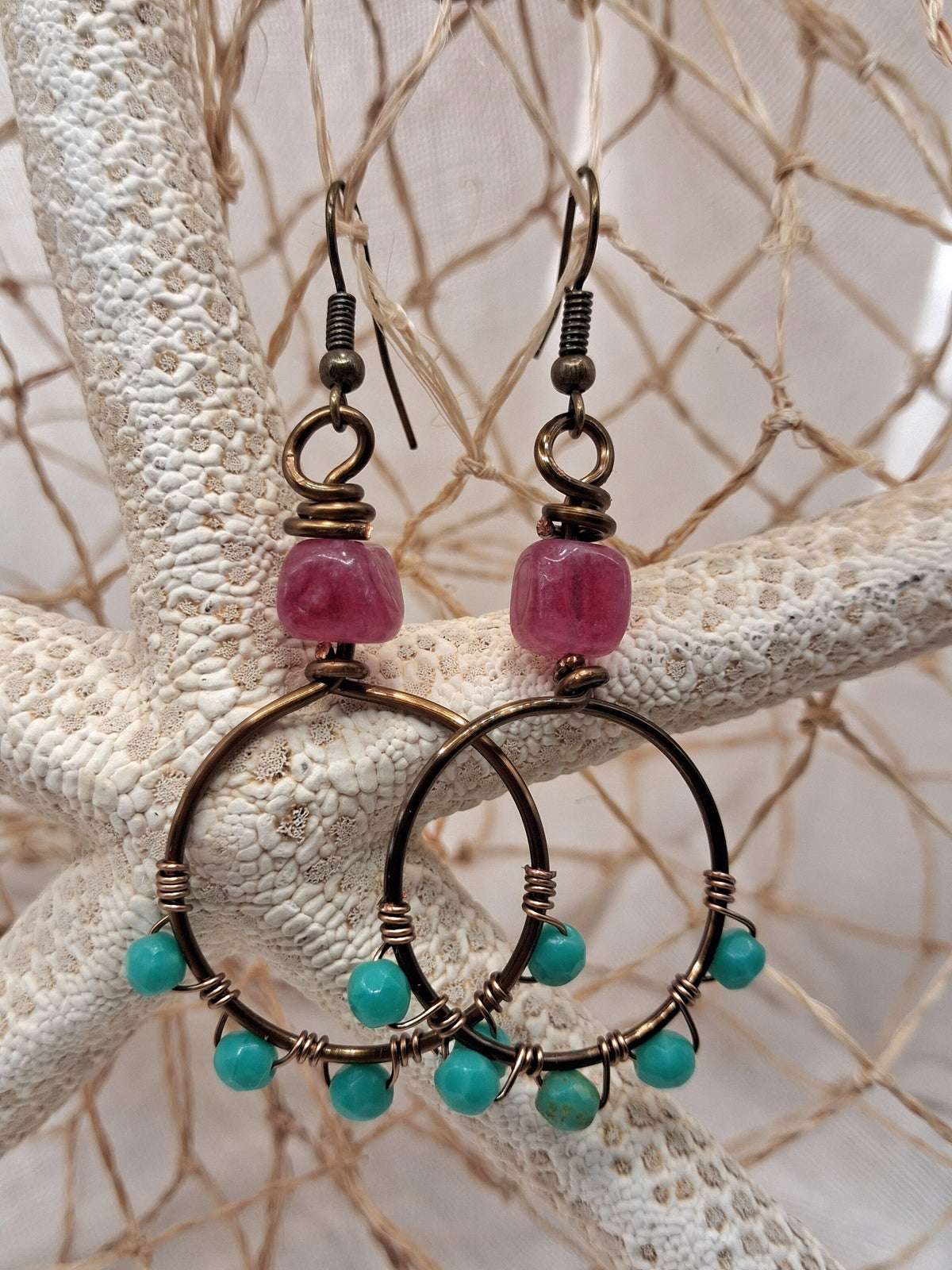Turquoise and wine wire wrapped cherry hoop earrings with bronze metal, handmade by Melly