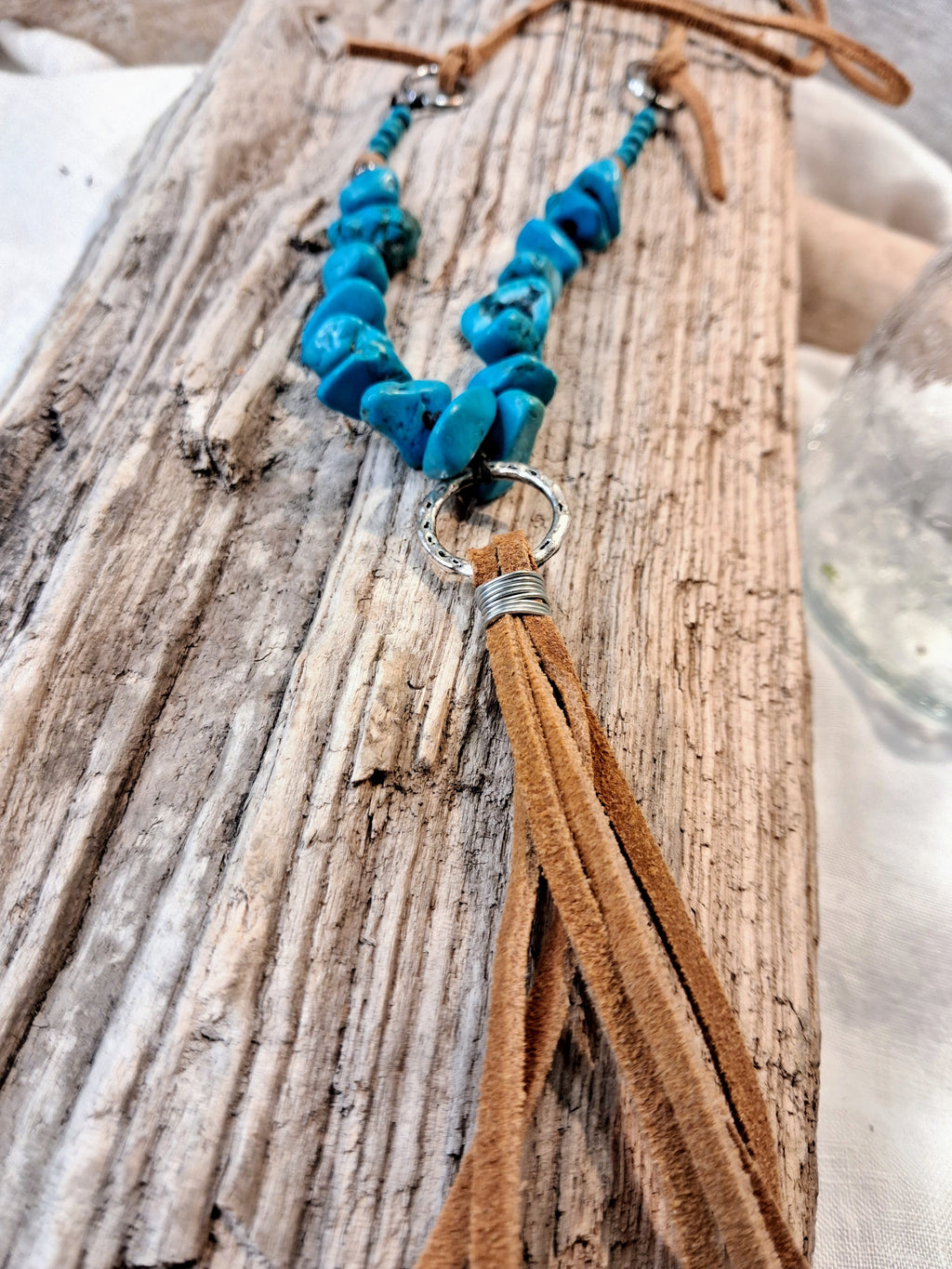 Blue turquoise stone chips and brown suede leather tassel necklace with a metal ring, handmade by Melly