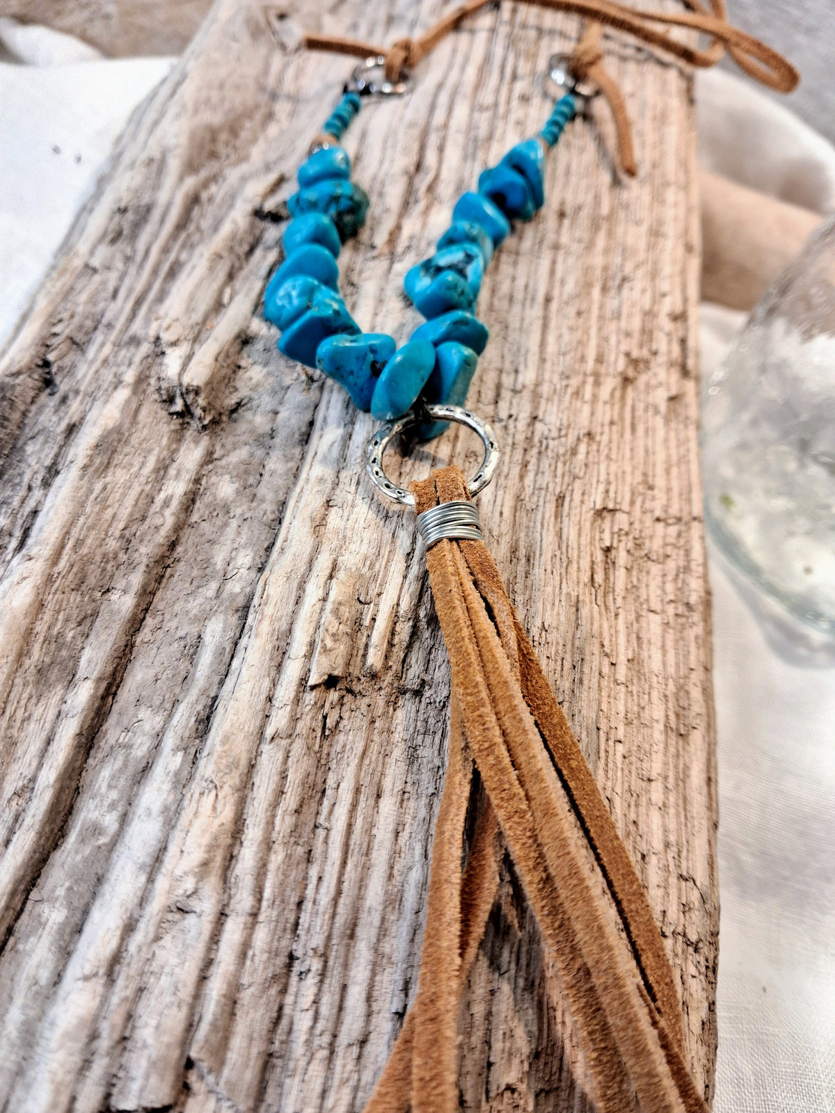 Blue turquoise stone chips and brown suede leather tassel necklace with a metal ring, handmade by Melly