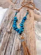 Turquoise beaded leather tassle necklace with natural stone chips and suede cord, handmade by Melly