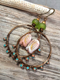 Turquoise and copper wire-wrapped hoop earrings handmade by Melly