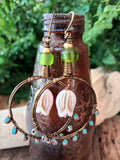Turquoise and pink copper wire-wrapped hoop earrings handmade by Melly
